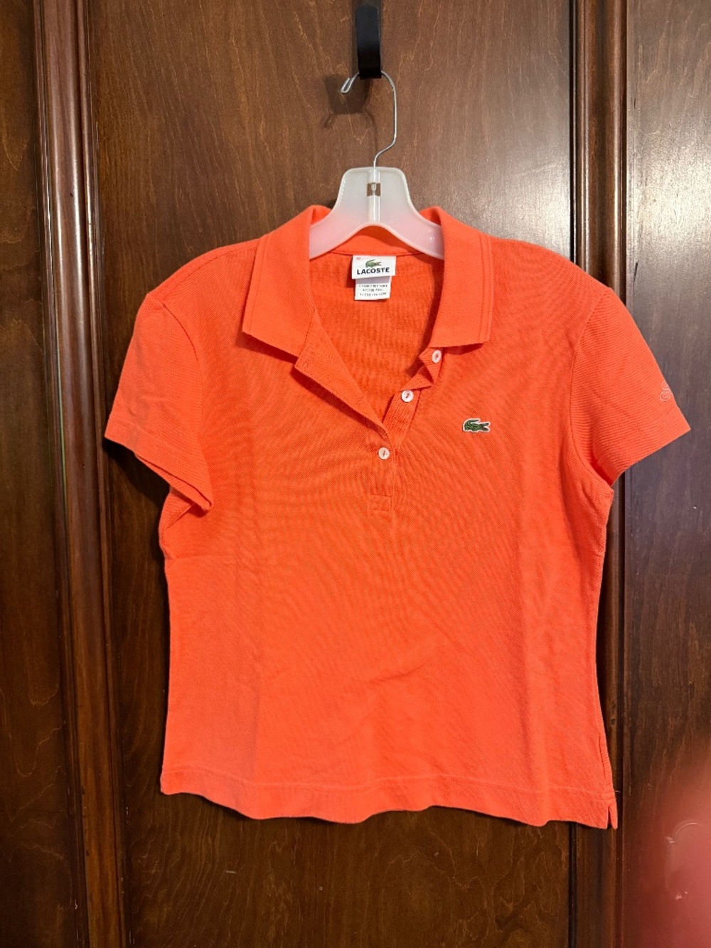Lacoste orange polo shirt